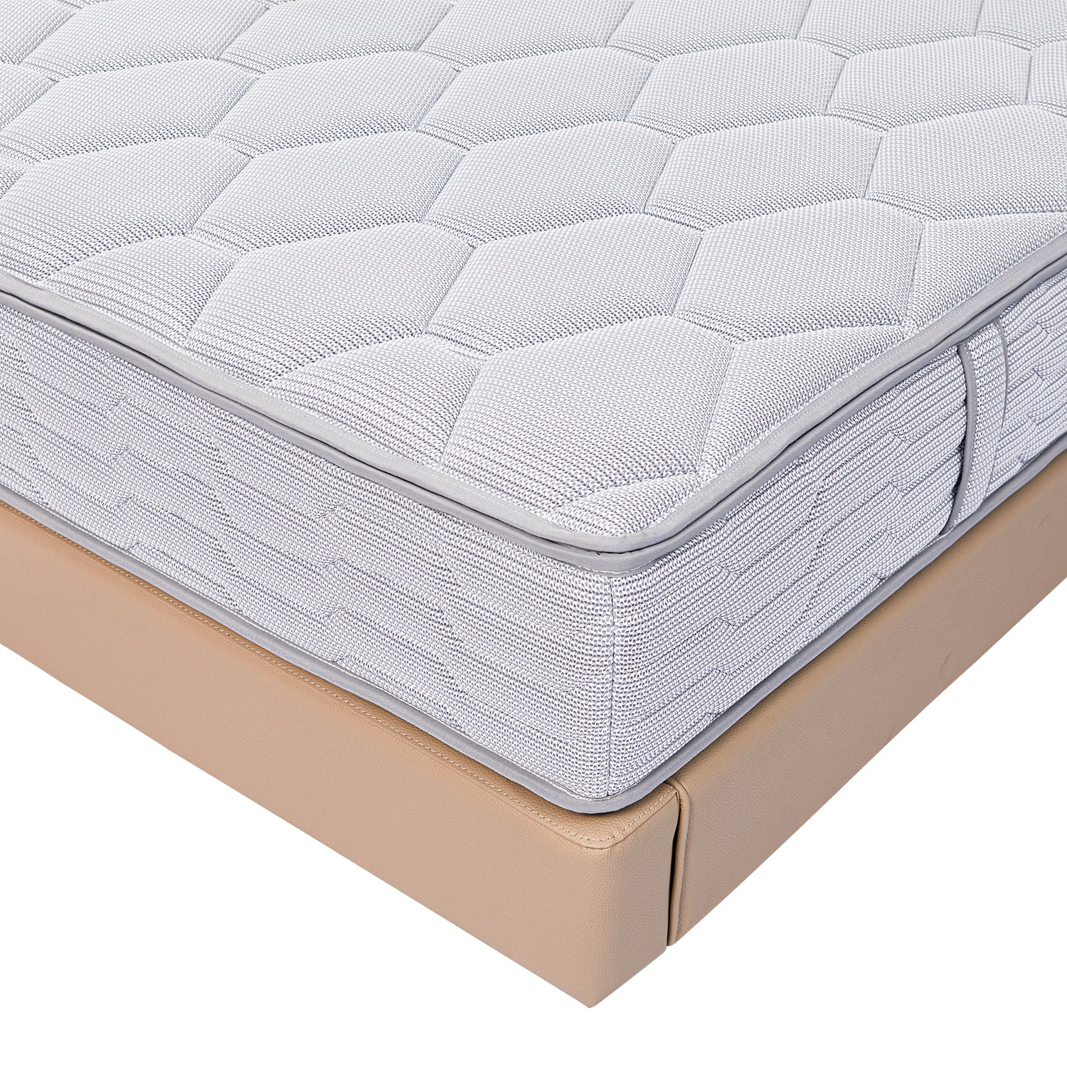 Close-up view of a white quilted mattress with geometric patterns on a beige DeRUCCI bed frame, showcasing quality craftsmanship and attention to detail.