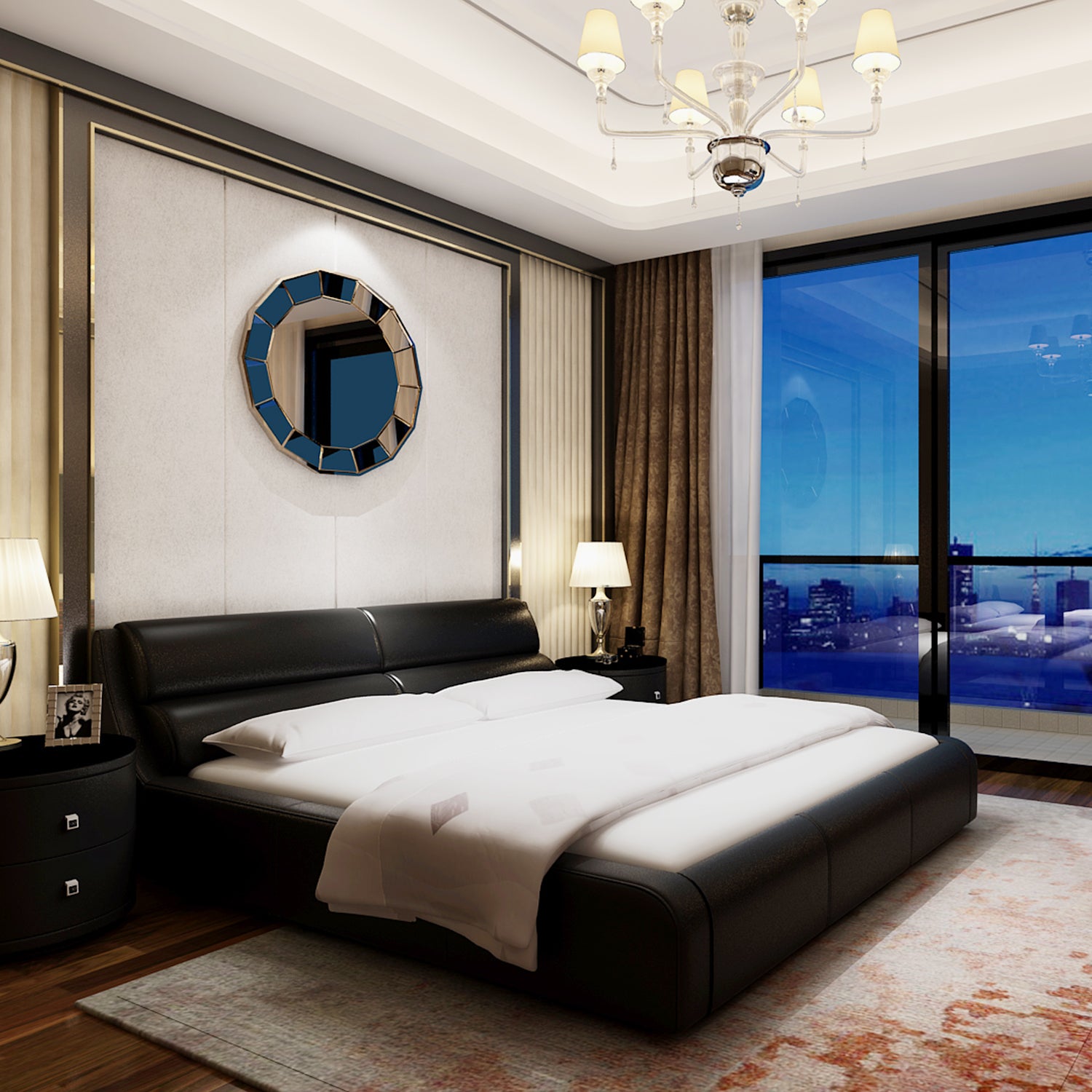 Luxurious bedroom with black leather bed frame, white bedding, circular wall mirror, bedside tables with lamps, chandelier, and large windows with cityscape view at dusk.
