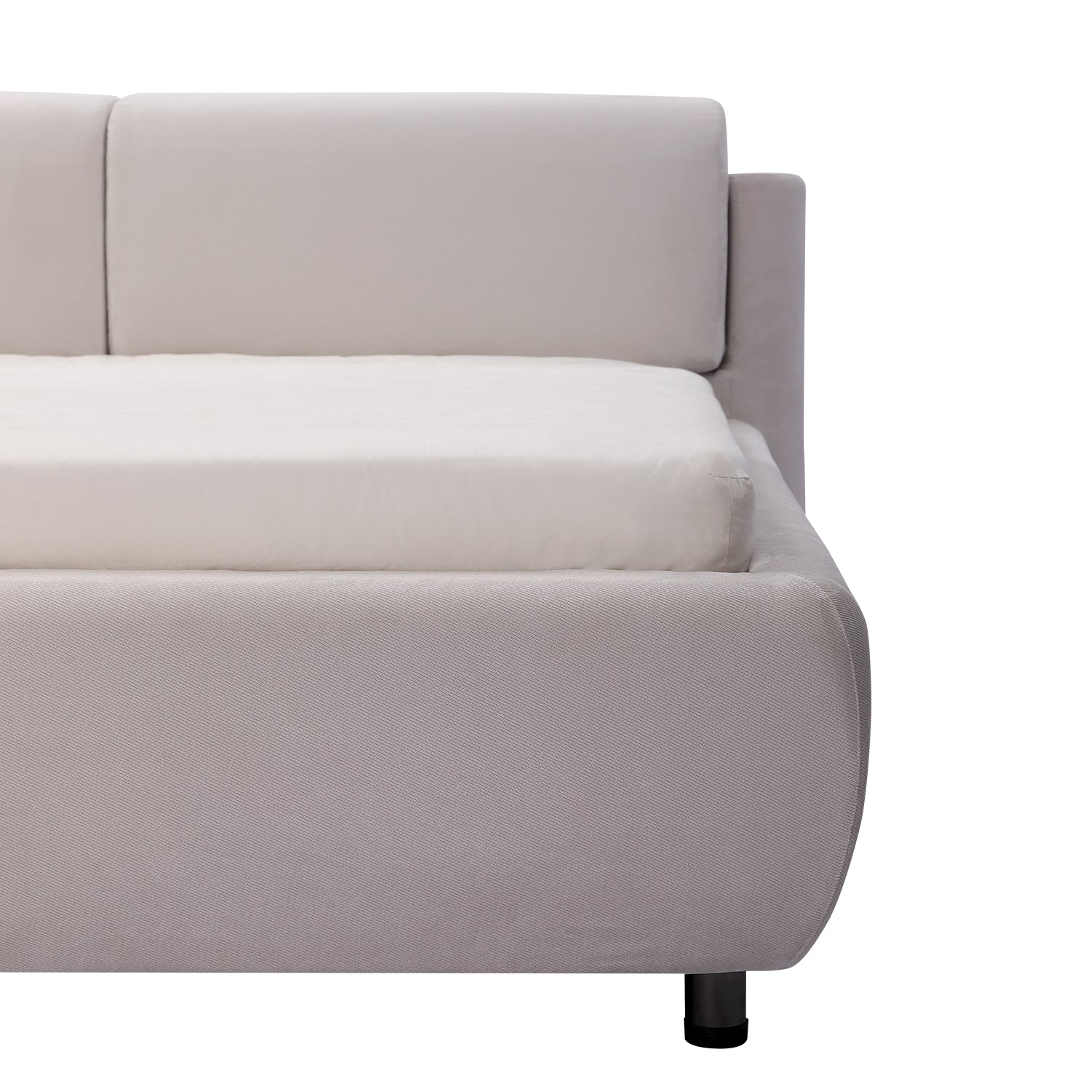 Modern minimalist bed frame with light upholstery, cushioned headboard, and white mattress, embodying contemporary design.