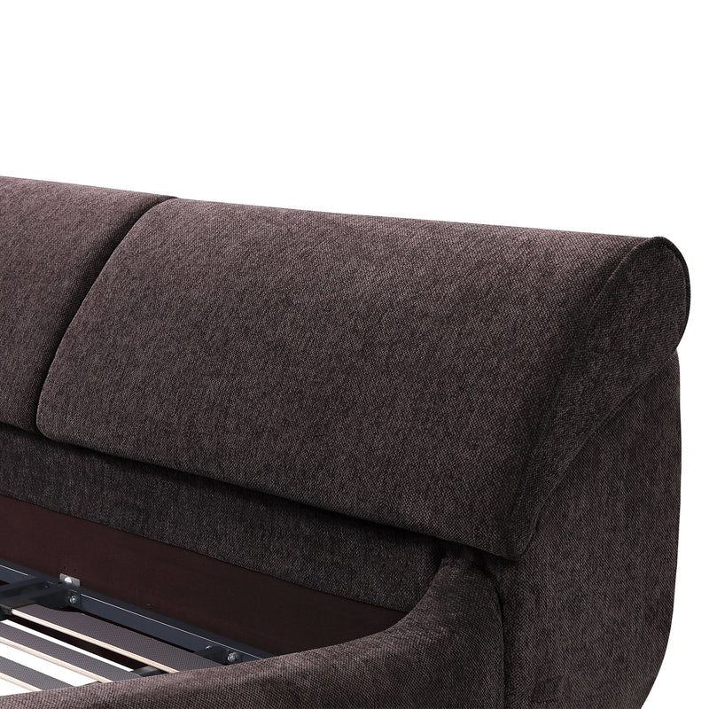 Close-up of dark brown upholstered bed frame cushion, showcasing sturdy construction and soft cushioning for back and shoulder support.