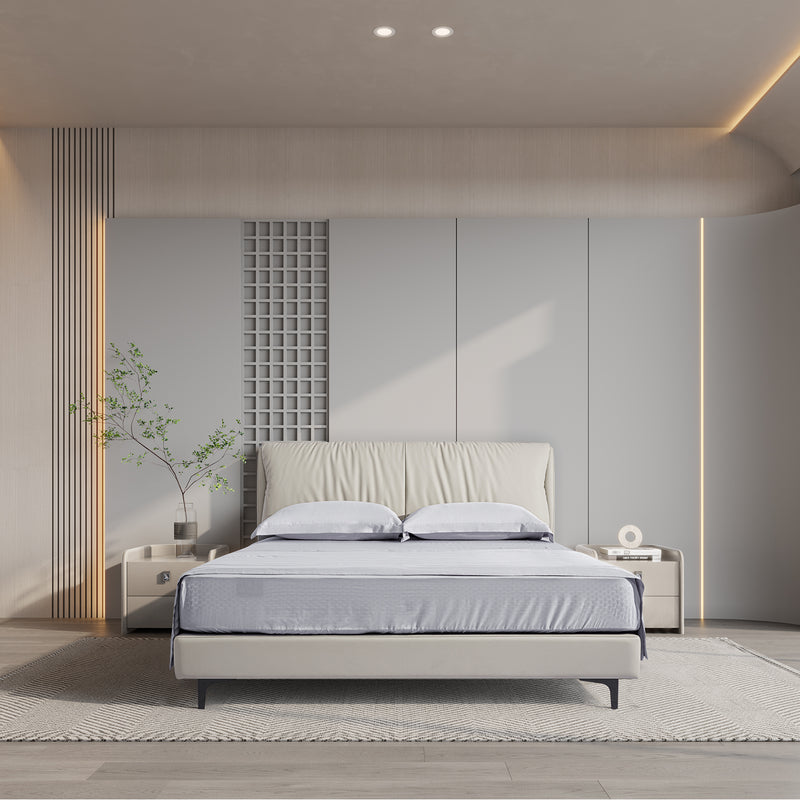 DeRUCCI Bed Frame BOC1-012 in modern bedroom with white leather, padded headboard, geometric accent wall, minimalist decor, and bedside table with green foliage
