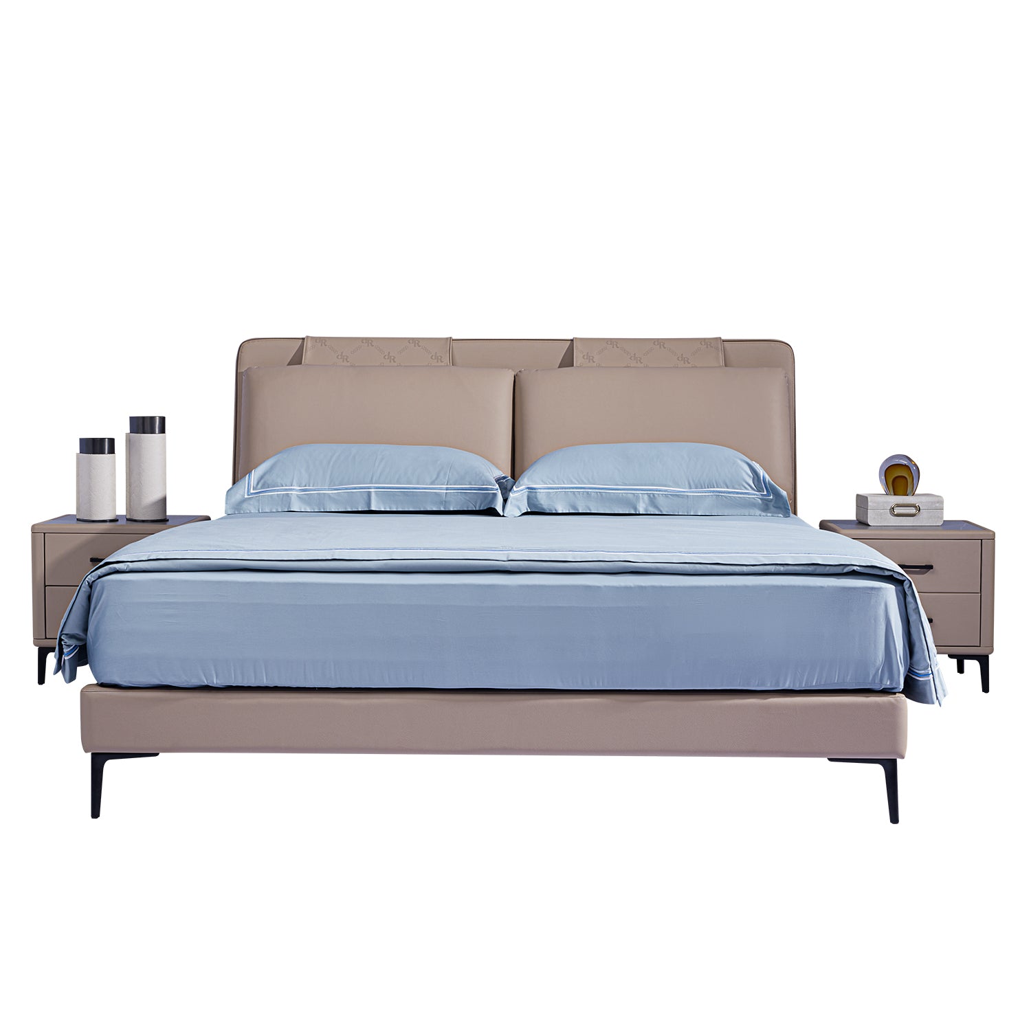 DeRUCCI BOC1 - 006 bed frame with beige upholstered headboard, blue bedding, and two matching nightstands with decorations. Modern and sleek bedroom furniture set.