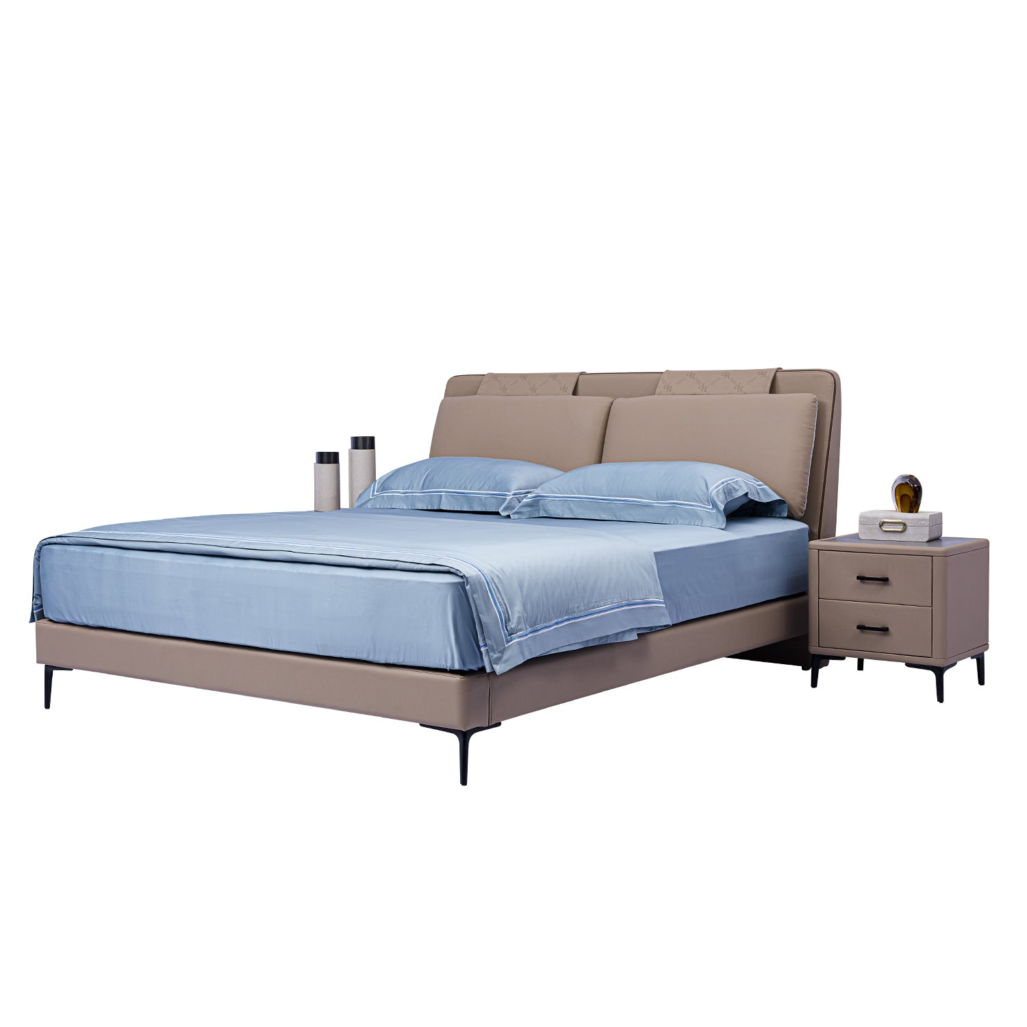 DeRUCCI Bed Frame BOC1 - 006 with beige fabric upholstery and cushioned headboard, blue bedsheets and pillows, and a matching nightstand with two drawers, metallic thermoses, and a small clock.