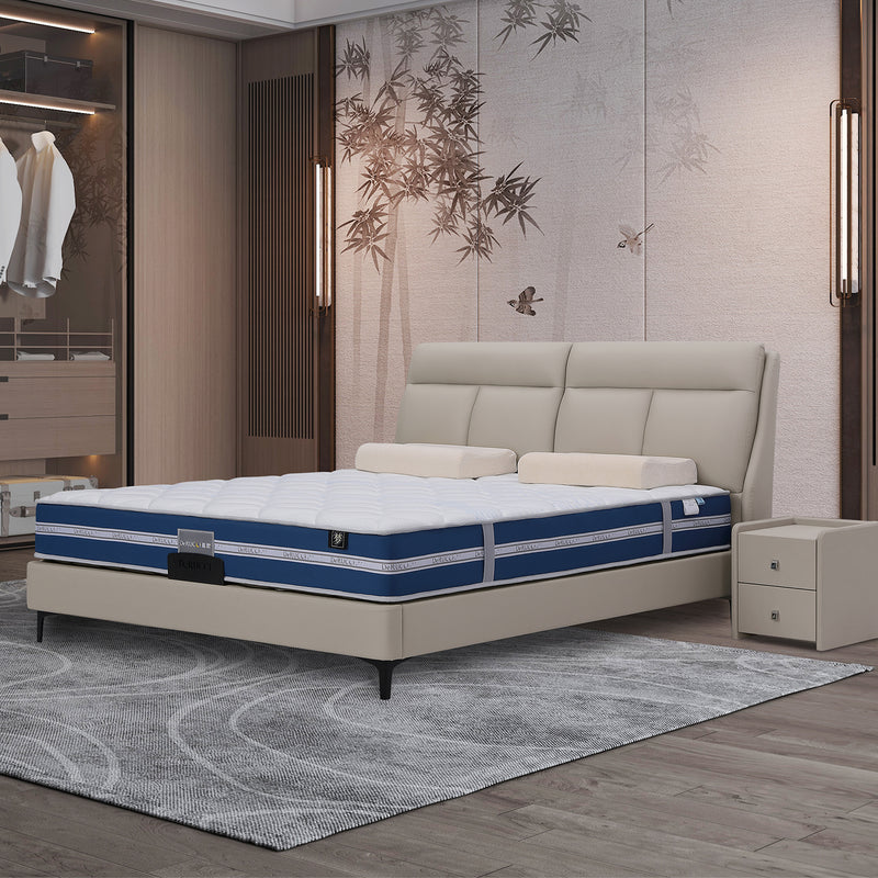 DeRUCCI bed frame BOC1 - 002 in beige leather with padded headboard, blue and white DeRUCCI mattress, and matching beige nightstand in a modern bedroom setting.