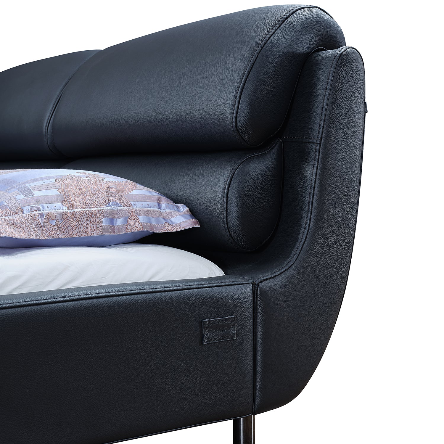 Close-up of DeRUCCI Bed Frame BZZ4 - 038 displaying thick, plush cushions made from premium cow leather, with part of a pillow and mattress visible.