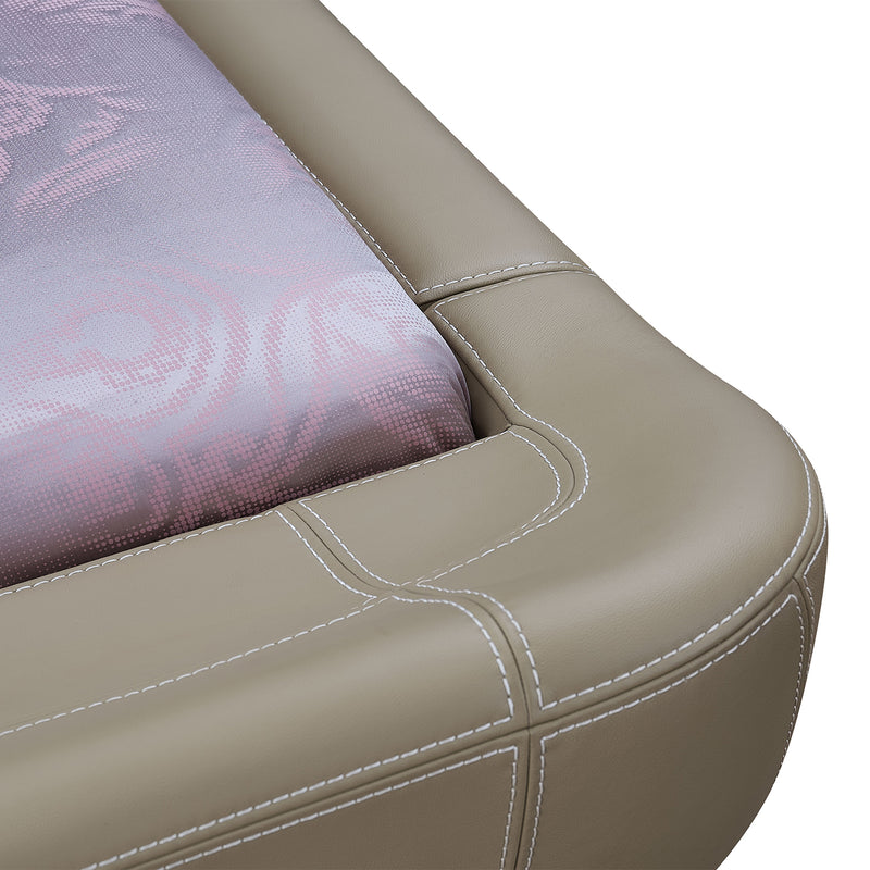 Close-up of beige leather bed frame corner with white stitching and purple patterned mattress.