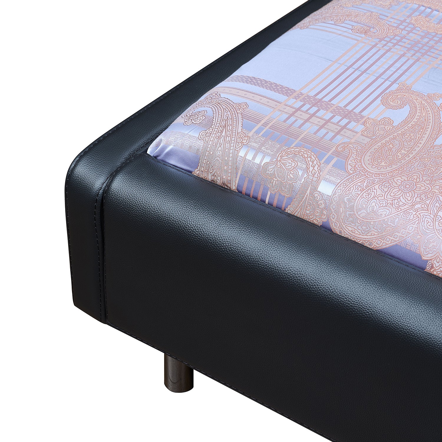 Close-up of Bed Frame BZZ4-038 in black premium cow leather with patterned bedsheet