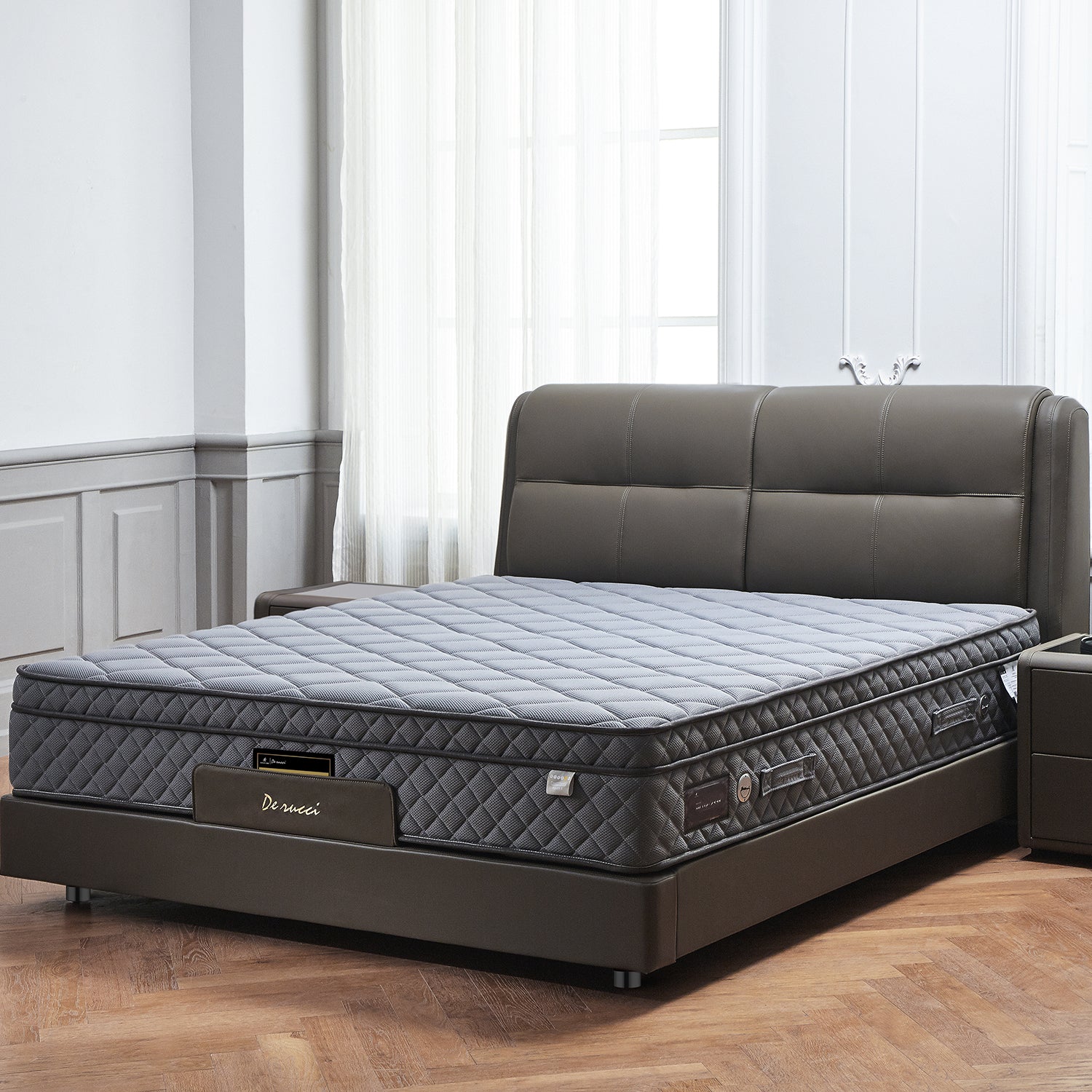DeRUCCI Bed Frame BZZ4-243 with minimalist design, featuring a dark grey leather upholstered headboard and a quilted mattress, placed in a room with light walls and wooden flooring.