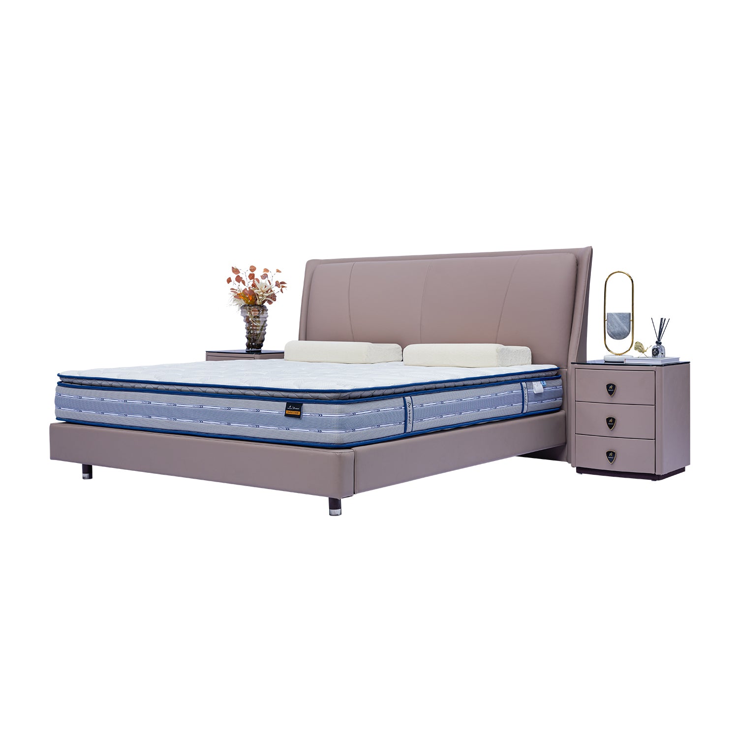 DeRUCCI Bed Frame BOC1 - 018 with beige upholstered headboard, blue mattress, and matching bedside tables with decorative items including a vase with dried flowers and a reed diffuser.