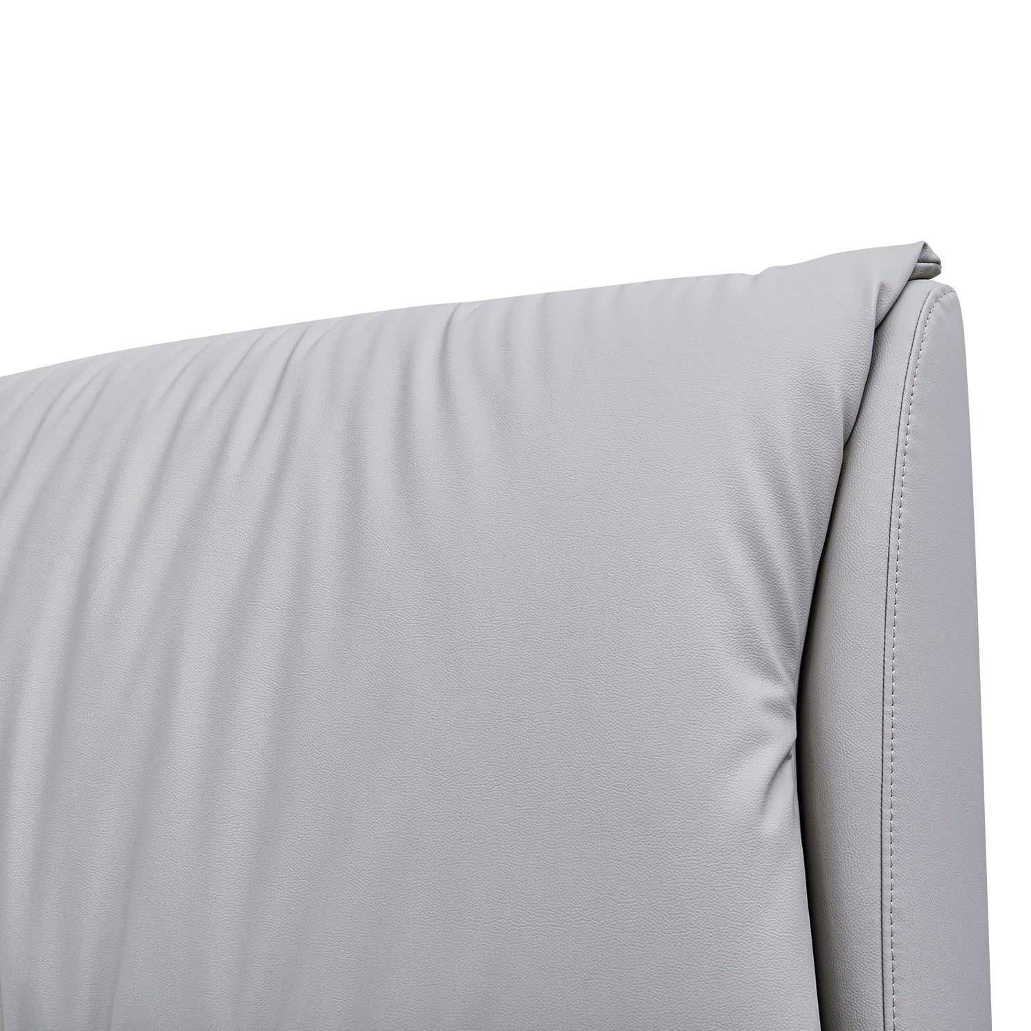 Close-up of padded white leather headboard with soft texture and polished stitching from DeRUCCI's Bed Frame BOC1 - 012 collection
