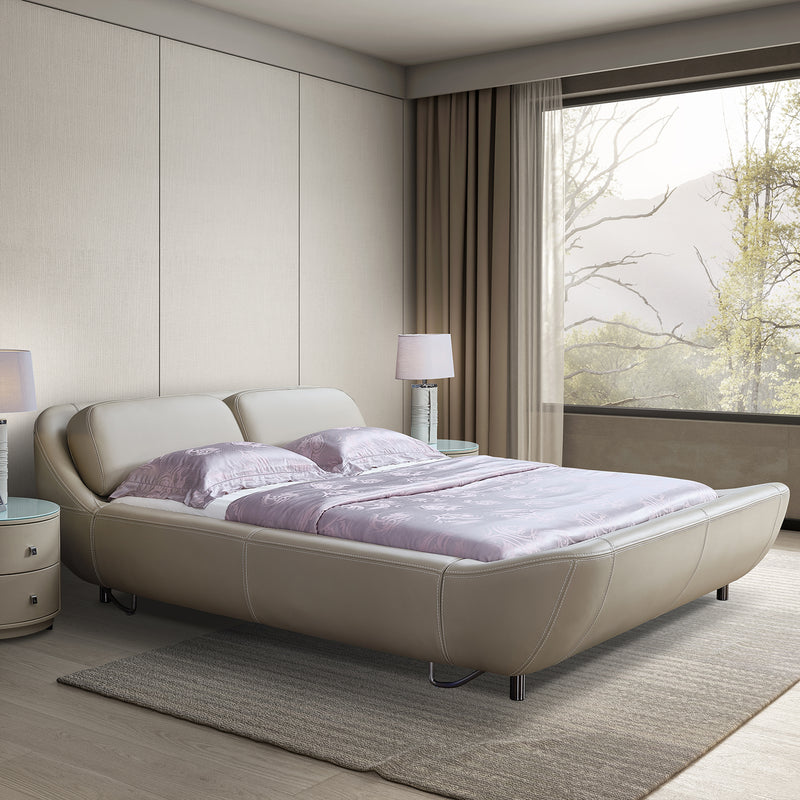 DeRUCCI Bed Frame BZZ4-024 in a modern bedroom setting, featuring a round beige leather design with light purple sheets and pillows, large window with beige curtains, and a serene view of trees outside.