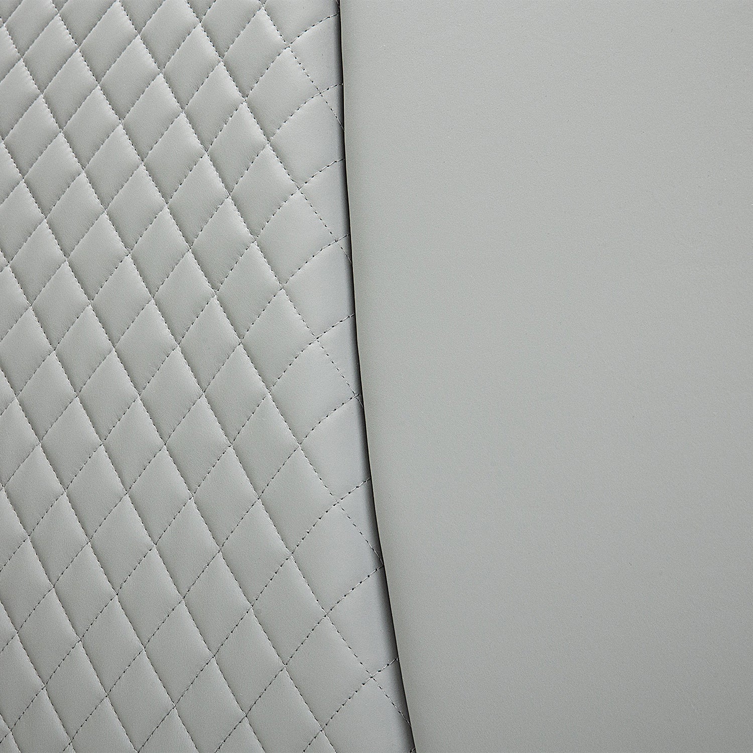 Close-up of quilted diamond pattern on light grey leather bed frame, showcasing texture and design of Bed Frame BOC1 - 005 by DeRUCCI