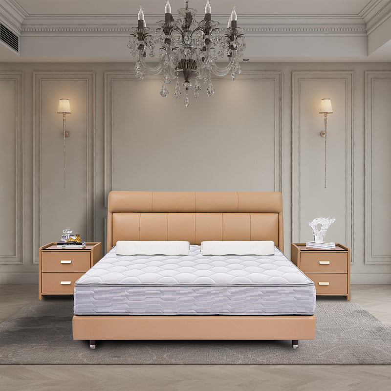 Elegant bedroom setup with beige leather bed frame and mattress, accompanied by matching bedside tables, crystal chandelier, and wall sconces