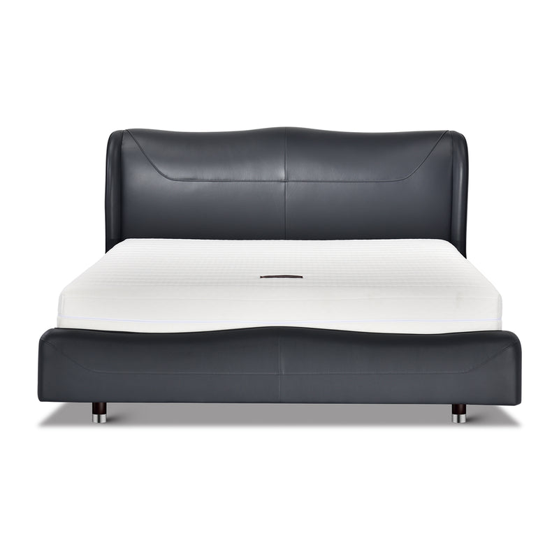 Modern deep sea blue leather DeRUCCI bed frame BZZ4 - 201 with a white mattress, featuring a wavy design and curved headboard.