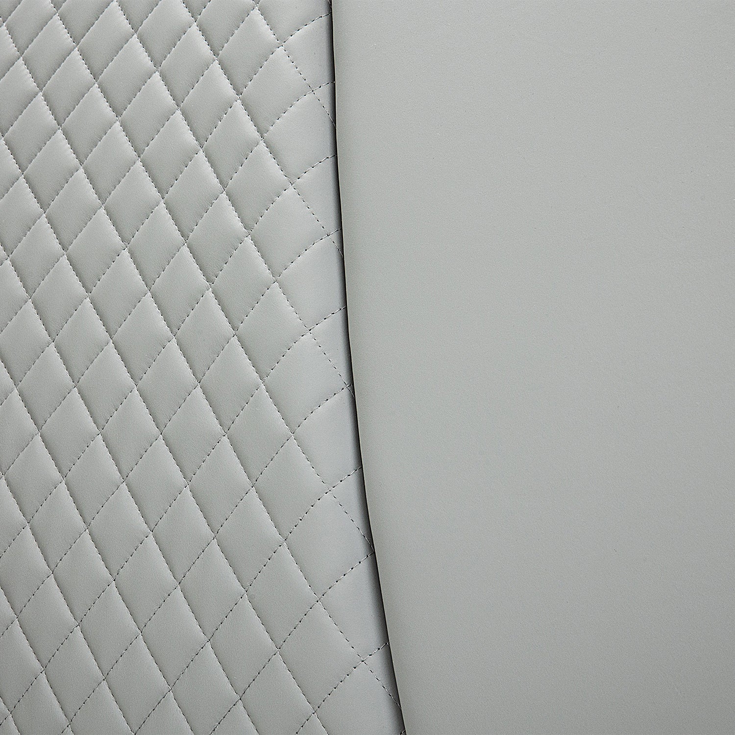 Close-up of quilted diamond pattern on light grey leather bed frame, showcasing texture and design of Bed Frame BOC1 - 005 by DeRUCCI